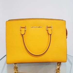 Mustard Mk hand bag.